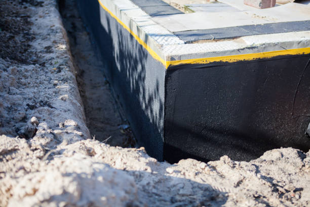 Professional Emergency Waterproofing technician working in Elsie, MI